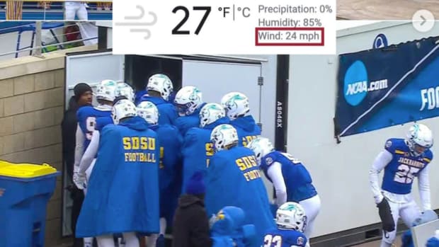South Dakota State football players pile into a heated trailer during their game against Villanova on Dec. 9, 2023.
